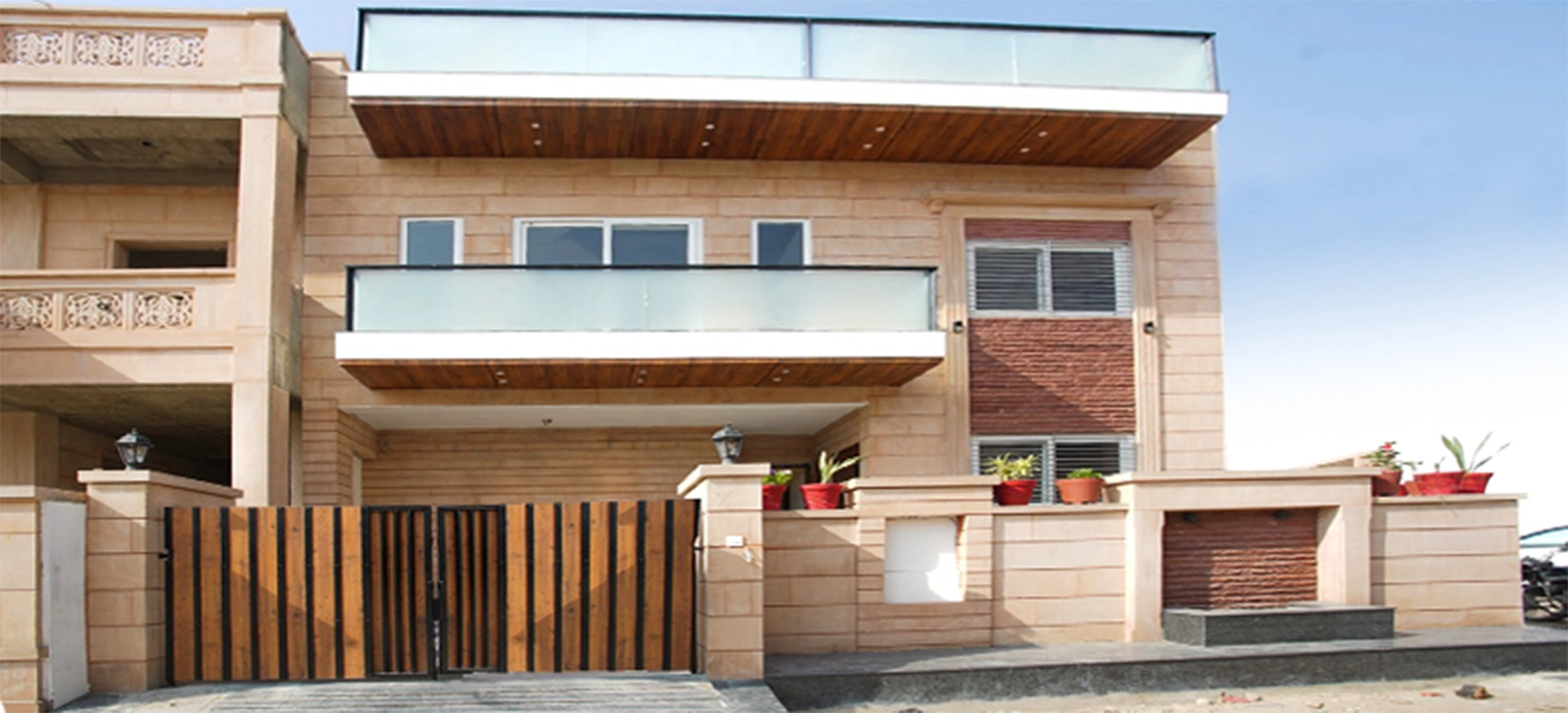 Contemporary home with stone and glass facade