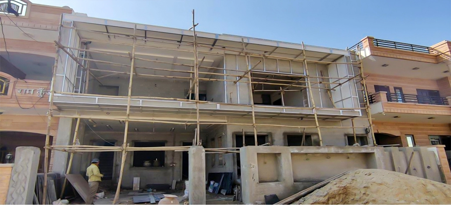 Building under construction with VIRAAT sign